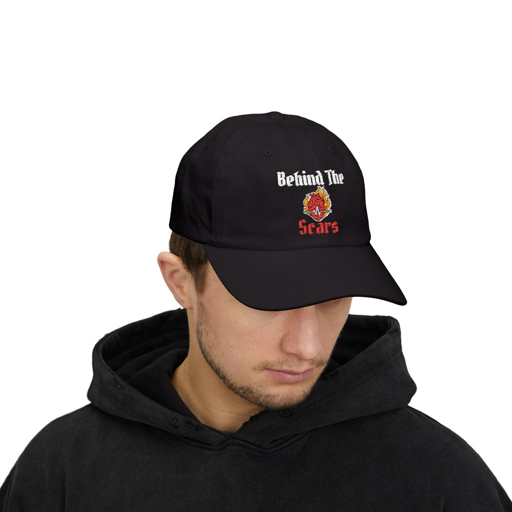 White Text of Behind The Scars Flaming Heart Embroidered Dad Cap